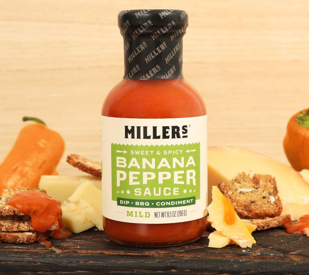 Banana Pepper Mild Sauce von Miller’s kaufen – süß-würzige Pfeffersauce mit milder Schärfe & mehrfach prämiert. Ideal für BBQ, Burger, Käse & Geschenke.