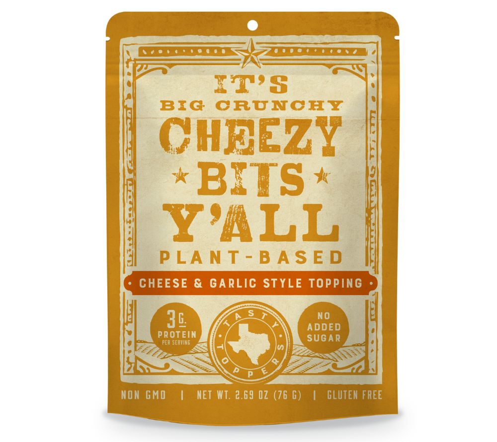 Cheese & Garlic Style Cheezy Snacks – vegan, glutenfrei & mit 33 g Protein. Intensiver Cheezy-Knoblauchgeschmack, perfekt als Snack oder Topping.